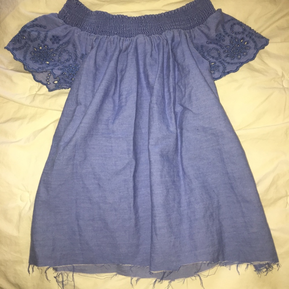 A jean blue crop top off the shoulder